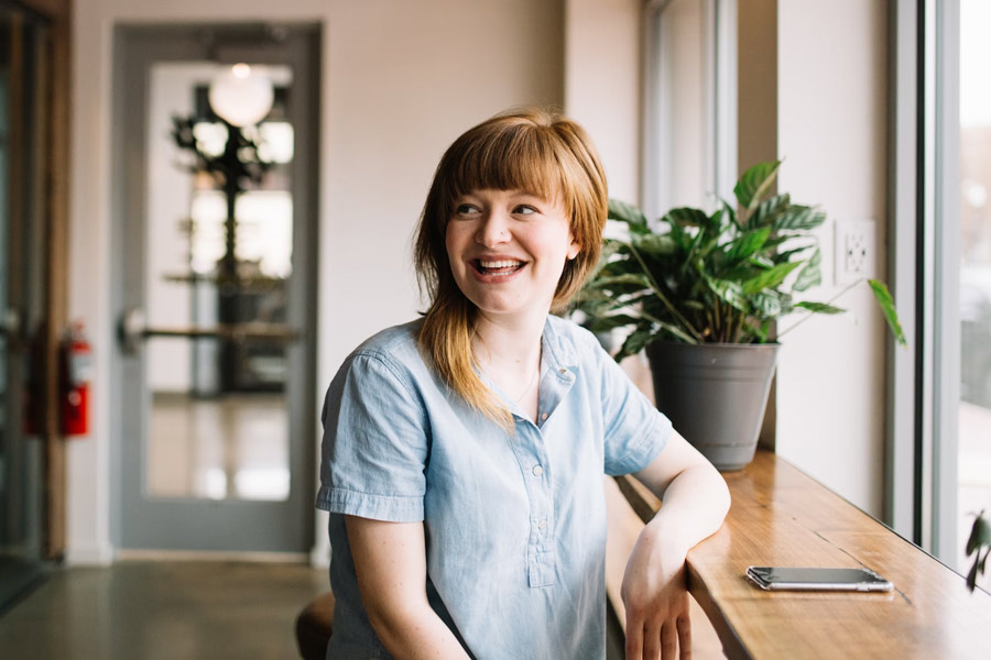 Young business woman sitting