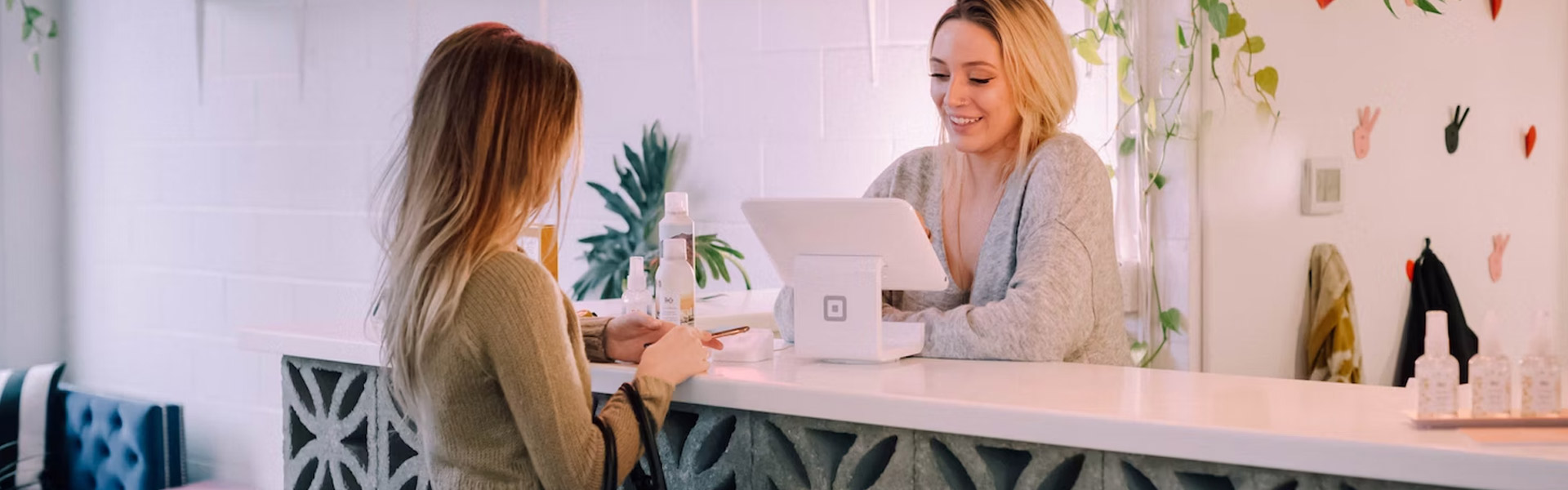 Woman making credit card purchase